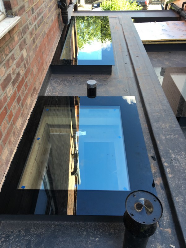 Multiple flat roof skylights on extension in Morden
